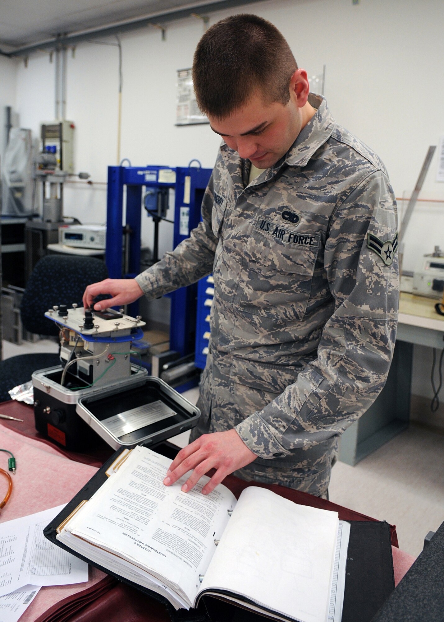Airman 1st Class Christopher Newberry, 31st Maintenance Squadron, a test, measurement and diagnostic equipment technician  adjusts alignments on a combustible gas detector. The Precision Measurement Equipment Laboratory compares a test instrument to a standard. These comparisons provide an unbroken chain of measurements from the customer's gear all the way back to the National Institute of Standards and Technology. (U.S. Air Force photo/Senior Airman Taylor L. Marr)

