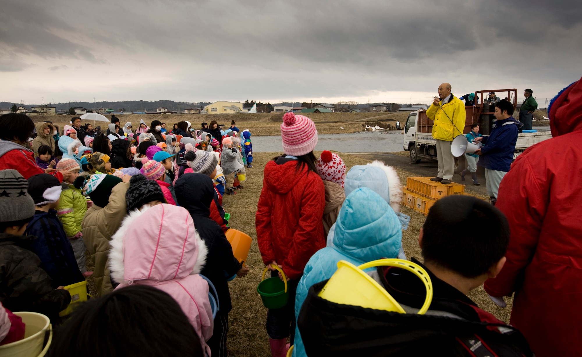 ORIASE TOWN, Japan -- Council Member Masaharu Baba, Oriase Town Tourist Association president, delivers opening remarks during the 14th Annual Baby Salmon Release at Salmon Park March 20. An estimated 400 Japanese and American volunteers attended the event. (U.S. Air Force photo/Staff Sgt. Samuel Morse)