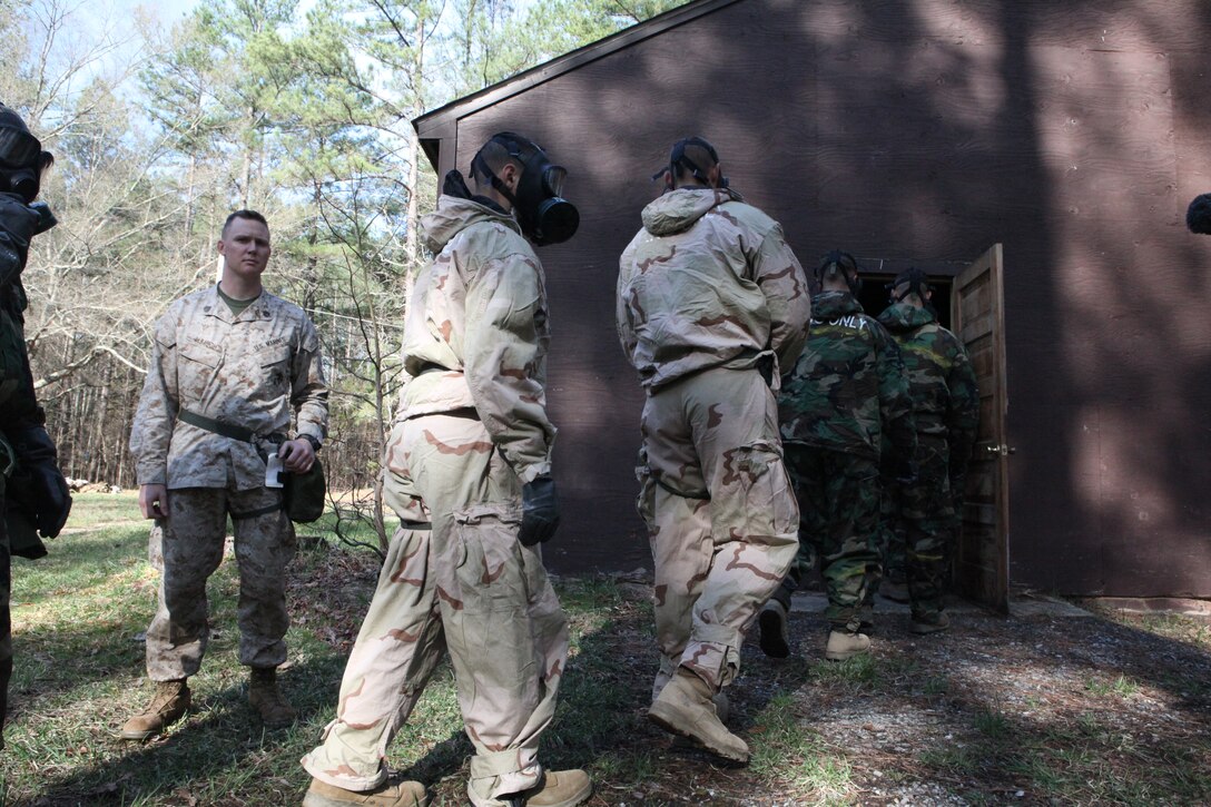 Marines with the 26th Marine Expeditionary Unit command element conduct gas chamber training in order to fulfill requirements for their annual training aboard Ft. Pickett, Va., March 24, 2010. The entire 26th MEU consisting of BLT 3/8, CLB 26, and VMM-266 will spend the next 6 months doing training for their upcoming deployment. (Official United States Marine Corps Photo by Lance Corporal Tammy K. Hineline)