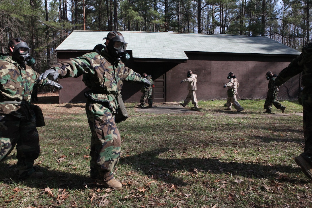 Marines with the 26th Marine Expeditionary Unit command element conduct gas chamber training in order to fulfill requirements for their annual training aboard Ft. Pickett, Va., March 24, 2010. The entire 26th MEU consisting of BLT 3/8, CLB 26, and VMM-266 will spend the next 6 months doing training for their upcoming deployment. (Official United States Marine Corps Photo by Lance Corporal Tammy K. Hineline)