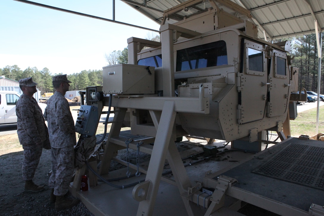 Marines attached to 26 Marine Expeditionary Unit conducted gas chamber and Humvee Egress Assistance Trainer (HEAT) at Fort Pickett, Va., March 24, in preparation for deployment. The 26 MEU will conduct six months of intense training prior to their deployment. (Official USMC photo by LCpl Tammy Hineline)(Released)