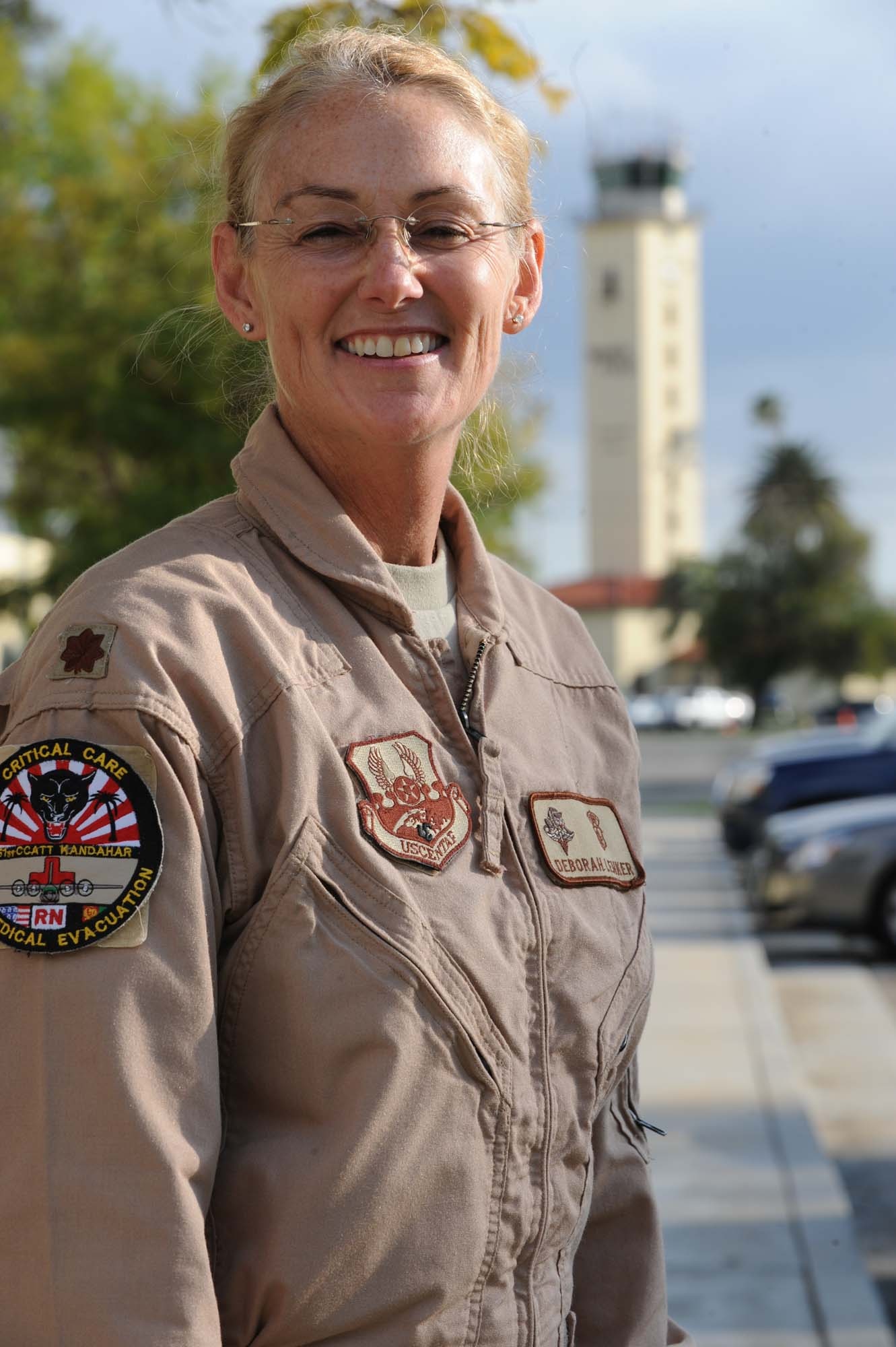 Maj. Deborah "Lucy" Lehker, 452nd Aeromedical Evacuation Squadron, stopped at March ARB for outprocessing Mar. 10, 2010, before continuing to her home in Phoenix, Ariz.  Major Lehker was returning from a six-month deployment to Afghanistan as a nurse with a Critical Care Transportation Team.  (U.S. Air Force Photo by Tech. Sgt. Carolyn Erfe)