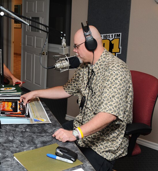 LAS CRUCES, N.M. -- Arlan Ponder, 49th Fighter Wing Public Affairs media relations chief, speaks during a KBLC radio show Oct. 15, 2009. Mr. Ponder recently took second place for Outstanding Intermediate Grade Civilian in the 2009 Air Force Public Affairs Awards for Communication Excellence. (U.S. Air Force photo by Airman 1st Class Veronica Stamps)