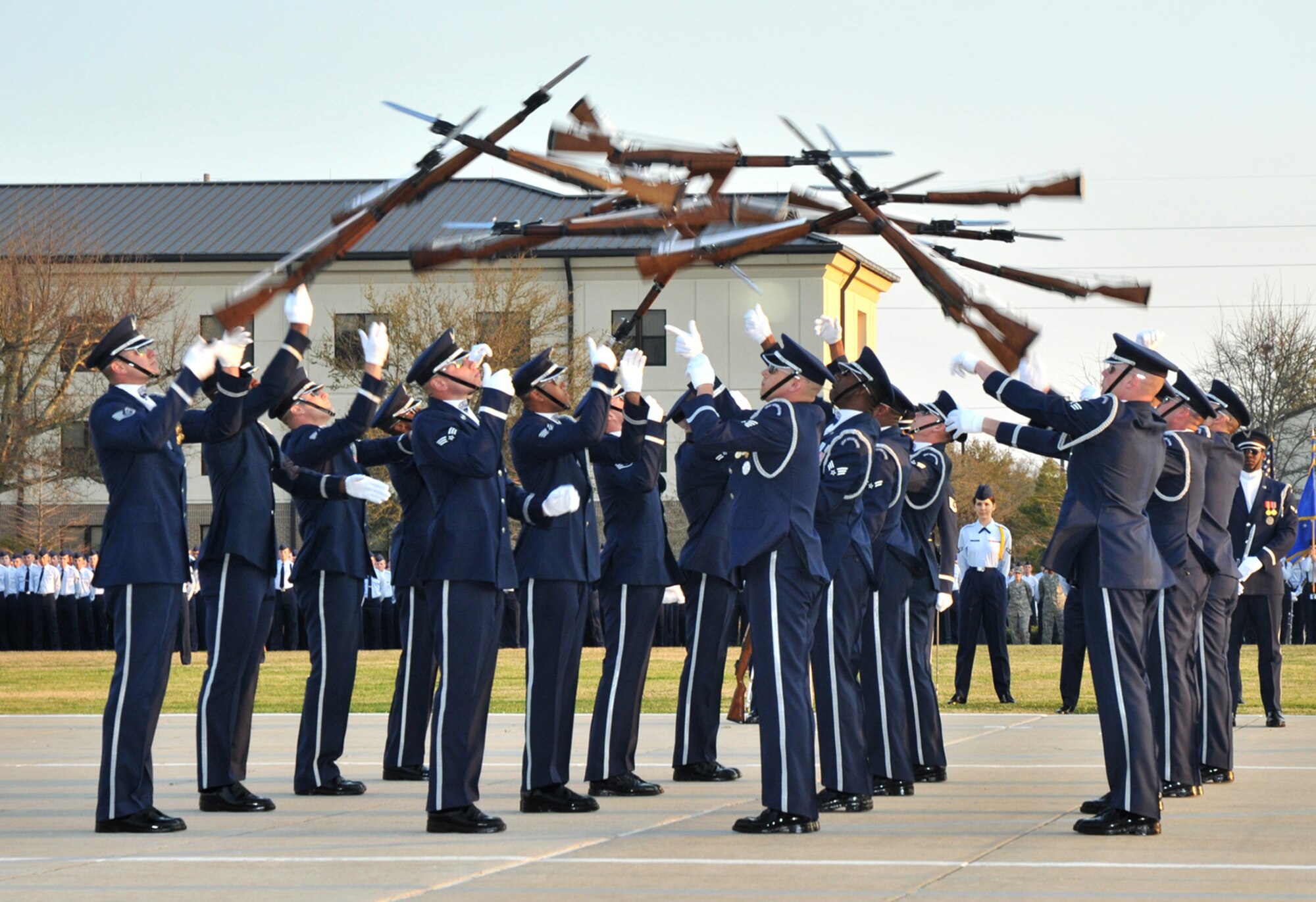 The Air Force Honor Guard Drill Team performs March 18 at the 81st Training Group parade.  (U.S. Air Force photo by Adam Bond)