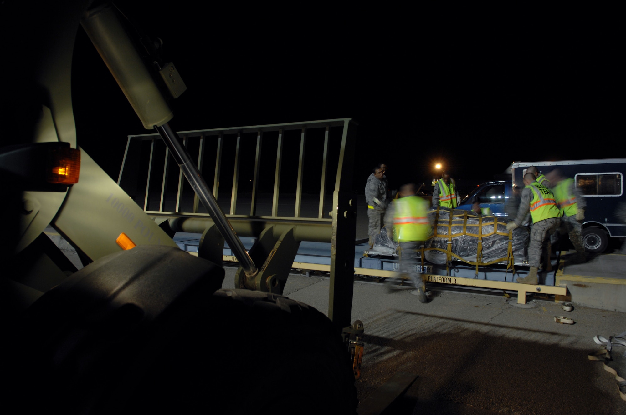 HOLLOMAN AIR FORCE BASE, N.M. -- Airmen from the 49th Logistics Readiness Squadron prepare cargo March 19, 2010, for deployment to Chile. The cargo contains baggage and supplies that will help in the relief operations in Chile following the 8.8 magnitude earthquake that hit the South American nation Feb. 27, 2010. (U.S. Air Force photo by Airman 1st Class Joshua Turner)(Released)