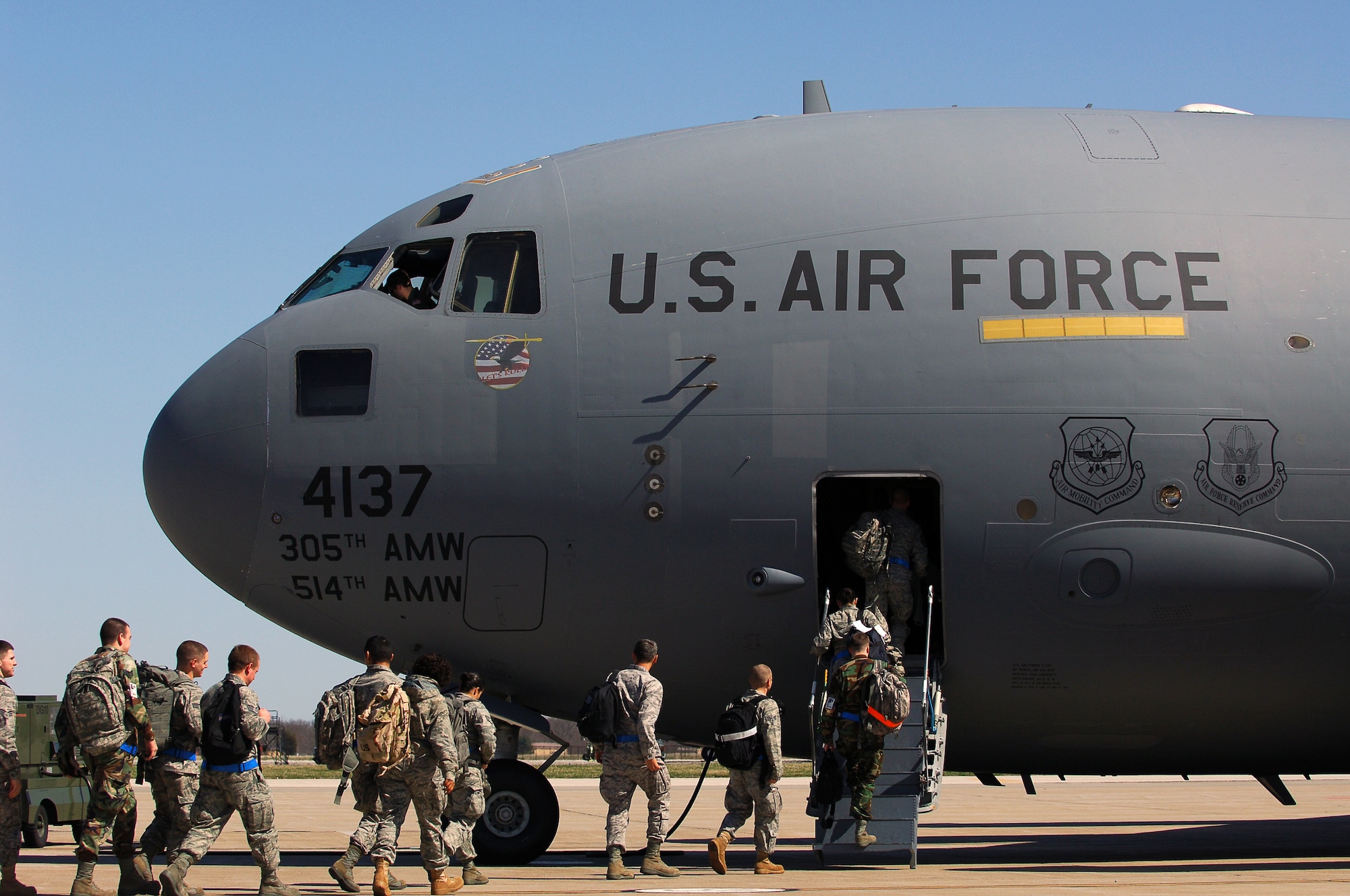 SCOTT AIR FORCE BASE, Ill. – Airmen from the 375th Air Mobility Wing board a C-17 Globemaster to fly to their simulated deployed location during the Operational Readiness Inspection, March 23, 2010. The 375th Air Mobility Wing is being graded by the Air Mobility Command inspector general to ensure they are able to respond to a global threat and deploy combat ready Airmen at a moments notice. (U.S. Air Force photo by Senior Airman Ryan Crane)