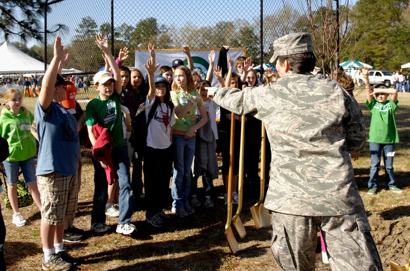 Col. Martha Meeker selects students to assist her in planting an Eastern Redbud tree during the Earth Day festivities held on the picnic grounds at Joint Base Charleston, S.C., March 24, 2010. The festival celebrates Earth day in conjunction with Arbor Day. Arbor day was originally founded by J. Sterling Morton in 1872. By the 1920s each state in the United States had passed public laws that stipulated a certain day to be Arbor Day or Arbor and Bird Day observance. These dates were established depending on climate and suitable planting times. Colonel Meeker is the 628th Air Base Wing Commander. (U.S. Air Force Photo/Airman 1st Class Lauren Main)
