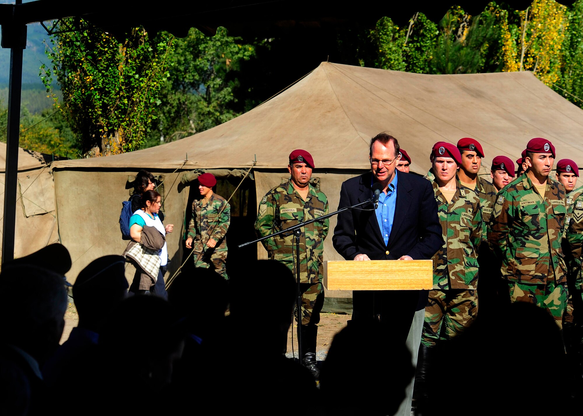 The U.S. Ambassador to Chile, Paul Simons, speaks during the donation ceremony of the expeditionary hospital to Angol citizens March 24, 2010, in Angol, Chile. While the local hospital in Angol is being rebuilt, this medical facility will provide much needed space to provide medical care for the nearly 110,000 in the Angol region. (U.S. Air Force photo/Senior Airman Tiffany Trojca)