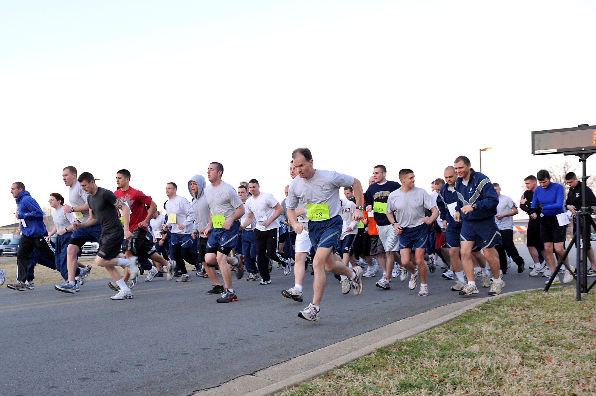 Little Rock Air Force Base runners sprint to a start March 19 at the corner of Sixth Street and Vandenberg Boulevard for the Military Saves 5K run. Awards were given to the top three finishers for male and female categories. (U.S Air Force photo by Senior Airman Christine Clark)