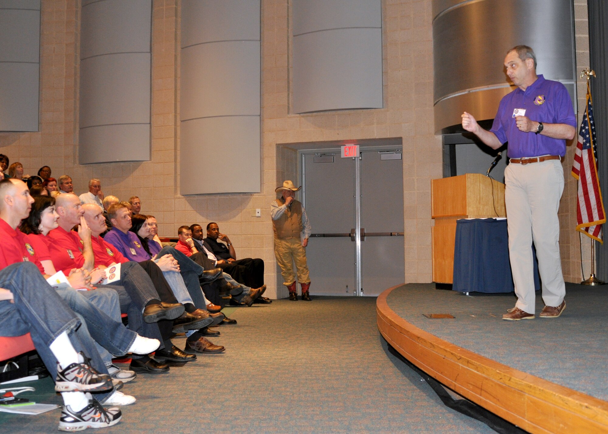 Col. John J. Mooney III, commander of the 917th Wing on Barksdale Air Force Base, La., addresses attendees and volunteers during a welcome briefing at a Yellow Ribbon Reintegration Program event March 20, 2010. The YRRP is a free Department of Defense program designed to aid in the reintegration of military members and their families when returning from a deployment. (U.S. Air Force Photo/Senior Airman Crystal Marie Jordan)