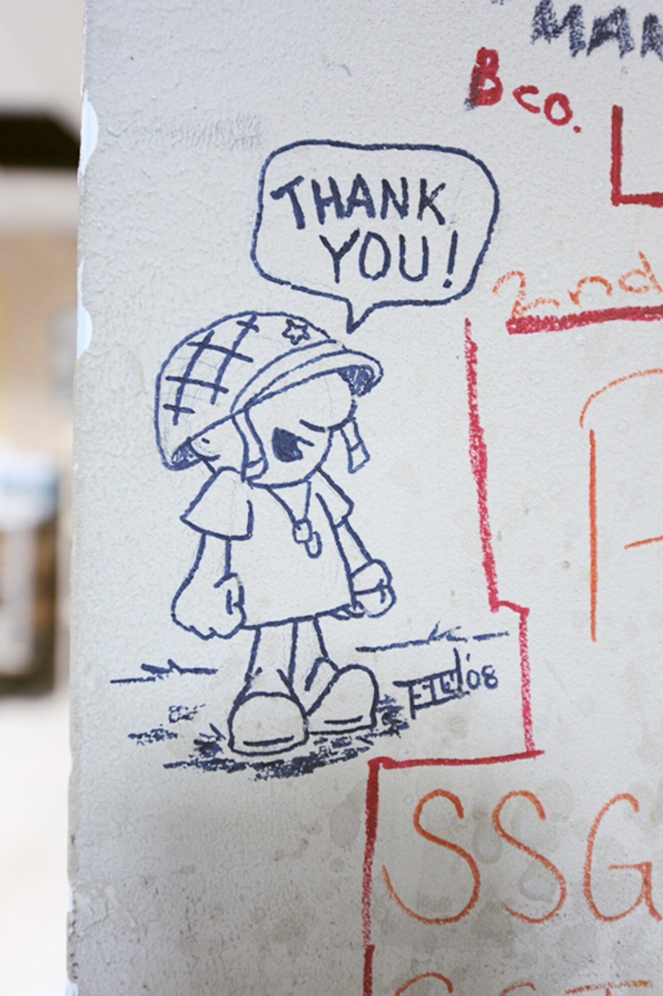Names and messages are scribbled on the wounded warrior wall at the contingency aeromedical staging facility at Joint Base Balad, Iraq. (U.S. Air Force photo/Master Sgt. Linda C. Miller)