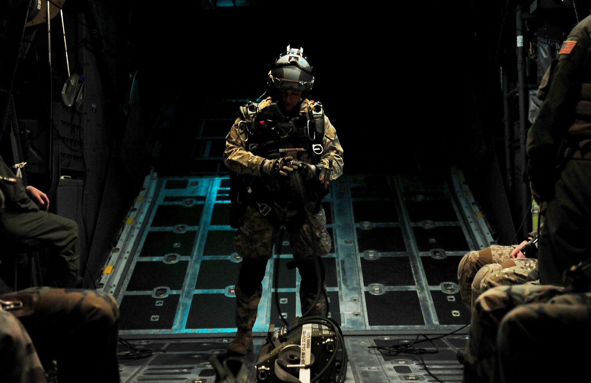 Airmen of the U.S. Air Force Special Tactics Training Squadron prepare to conduct a high altitude, low opening or HALO, mission near Fort Walton Beach, Fla., March 16, 2010, during Exercise Emerald Warrior 2010. U.S. military servicemembers participated in the U.S. Special Operations Command-sponsored, 19-day joint training exercise at multiple sites along Florida's Gulf Coast. (U.S. Air Force photo/Staff Sgt. Clay Lancaster)