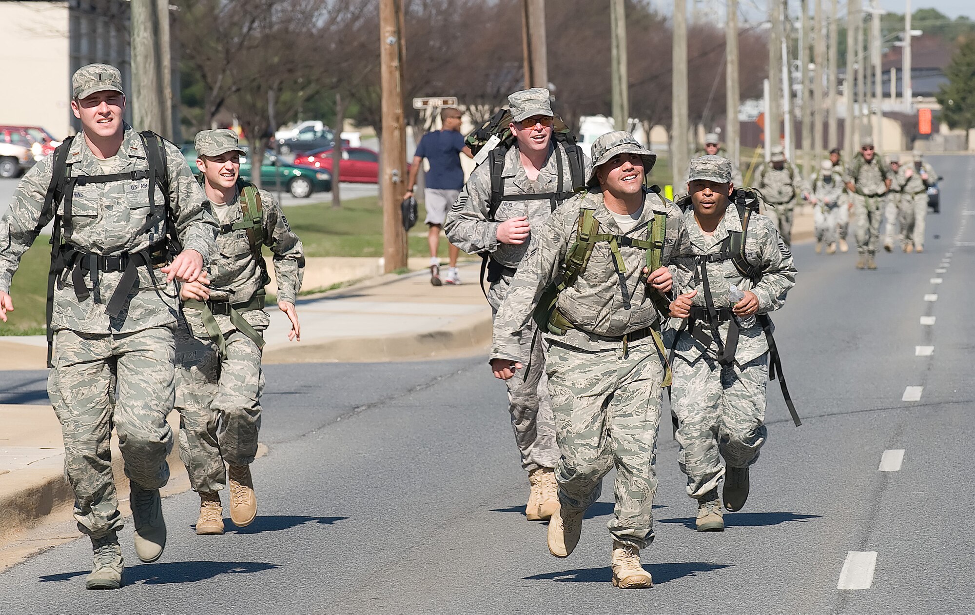 Team Dover Airmen sprint a leg of the 11th annual Ruck March, March 20 at Dover Air Force Base. The Airmen work together as a team to try and complete the Ruck March with the best time possible, in honor of those servicemembers who fought in the Battle of Chosin Reservoir. (U.S. Air Force photo/Jason Minto)
