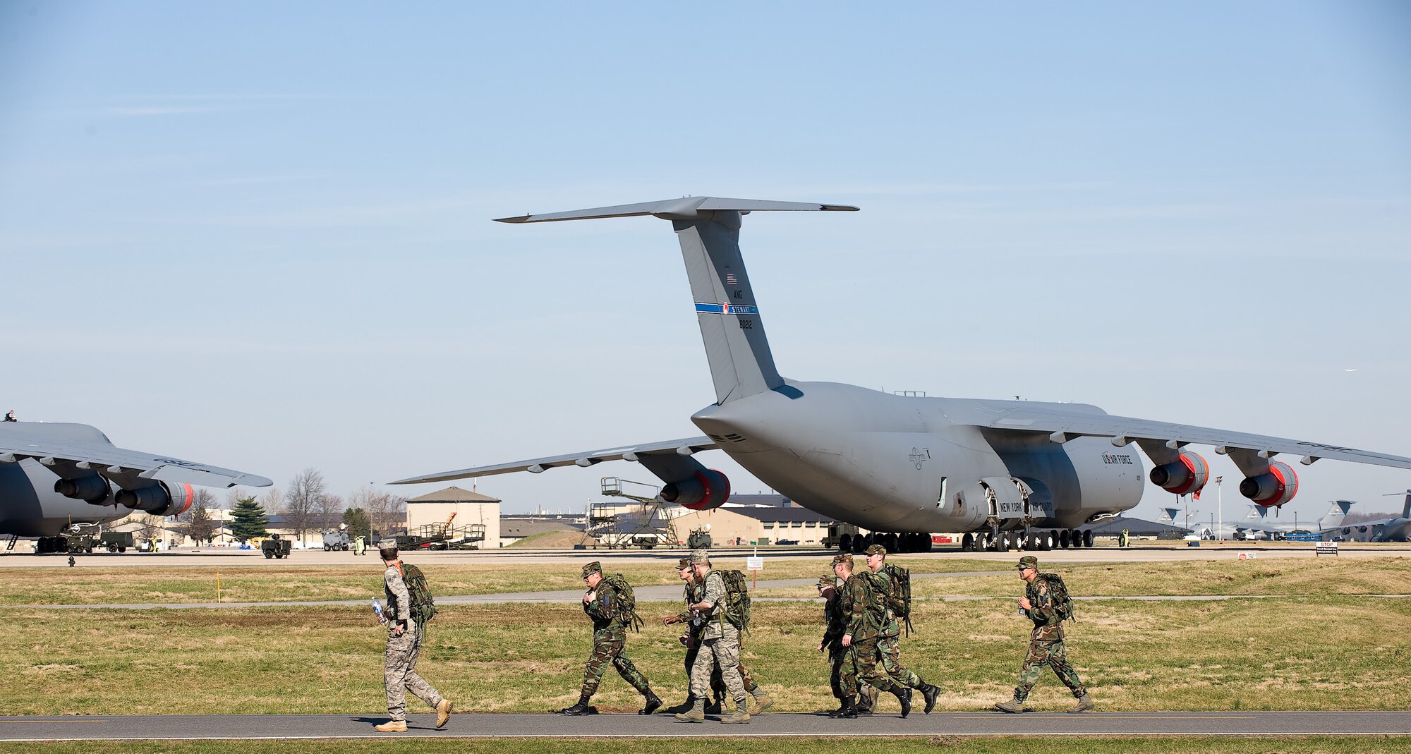 Team Dover Airmen run one leg of the 11th annual Ruck March, March 20 at Dover Air Force Base. The Airmen grouped into teams and ran in honor of those who gave their lives in the Battle of Chosin Reservoir. (U.S. Air Force photo/Jason Minto)
