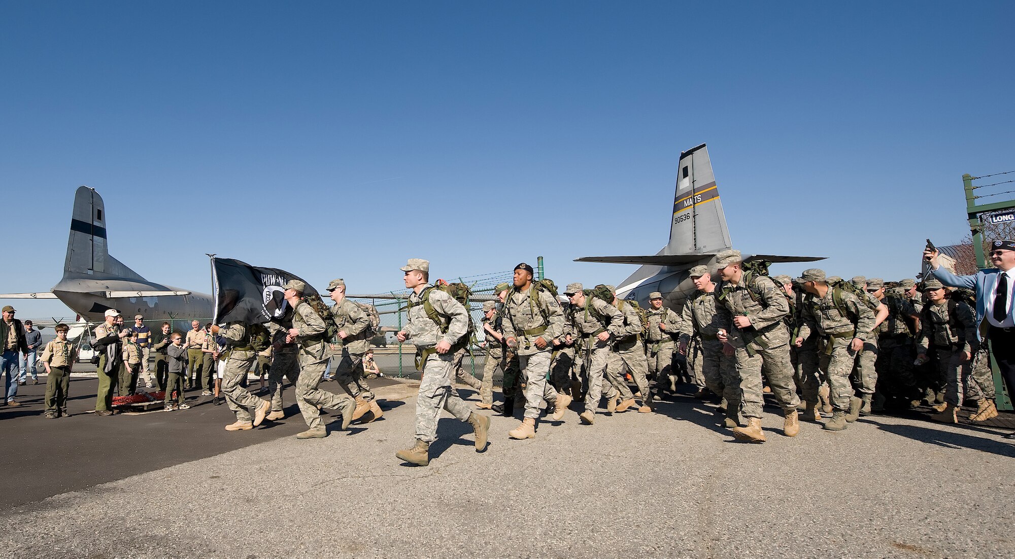 Team Dover Airmen start the 11th annual Ruck March, March 20 at the Air Mobility Command Museum, which acted as the starting point of the march. The march honors the 17 day battle in which more than 20,000 American troops fought in sub-freezing temperatures to break free from Chinese troops during the Korean War. (U.S. Air Force photo/Jason Minto)