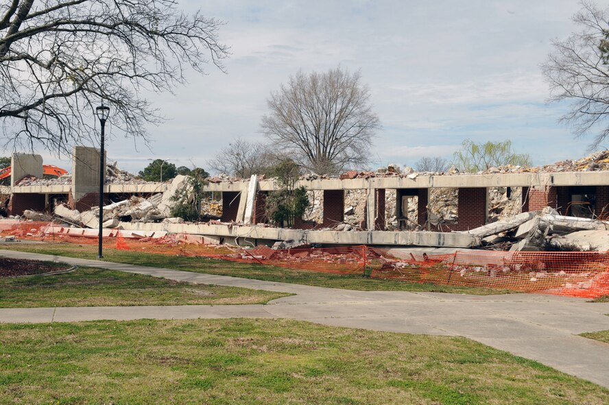 Demolition of Dormitory 3608 began in the beginning of March on Seymour Johnson Air Force Base, N.C. Base officials deemed the dorm unoccupiable in 2003 due to mold and other health concerns. (U.S. Air Force photo/Senior Airman Ciara Wymbs)  
