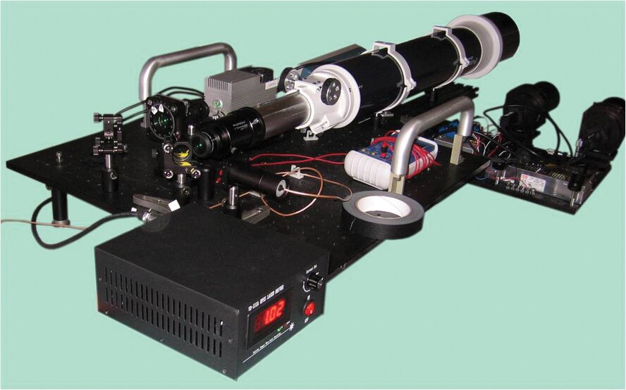 Small Business Innovation Research funded by AFRL and completed by Nanohmics, Inc., generated an Optical Target Identification System for directed energy weapons research.  Pictured is the OTIS setup used for field-based laser experimentation. (Photo courtesy of Ron Sullivan, Nanohmics)