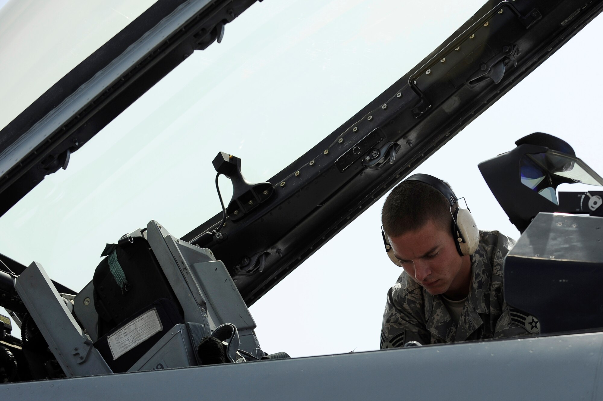 U.S. Air Force Senior Airman Anthony Creasey, 34th Expeditionary Fighter Squadron, recovers an F-16 at Bagram Airfield, Afghanistan, after the aircraft completed 30 code 1 flights, March 23, 2010. Airman Creasey is deployed from Hill Air Force Base, Utah, and is from Buchannon, W.Va. (U.S. Air Force photo by/ Tech. Sgt. Jeromy K. Cross/released)