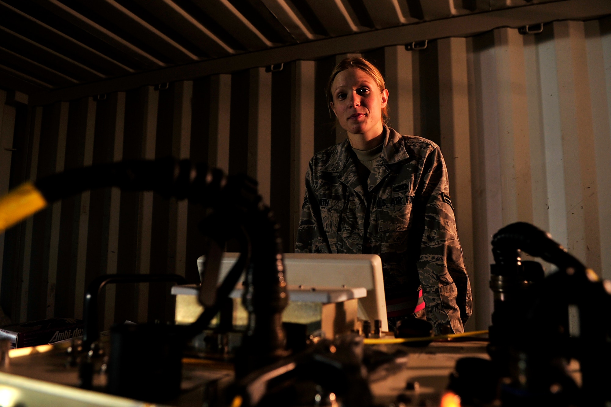 Airmen from the 18th Munitions Squadron build Mark 83 bomb bodies during Beverly High 10-02 at Kadena Air Base, Japan, March 24. The 18th Wing is participating in a Local Operational Readiness Exercise March 22-26 to test the readiness of Kadena Airmen. (U.S. Air Force photo/Senior Airman Amanda Grabiec)   