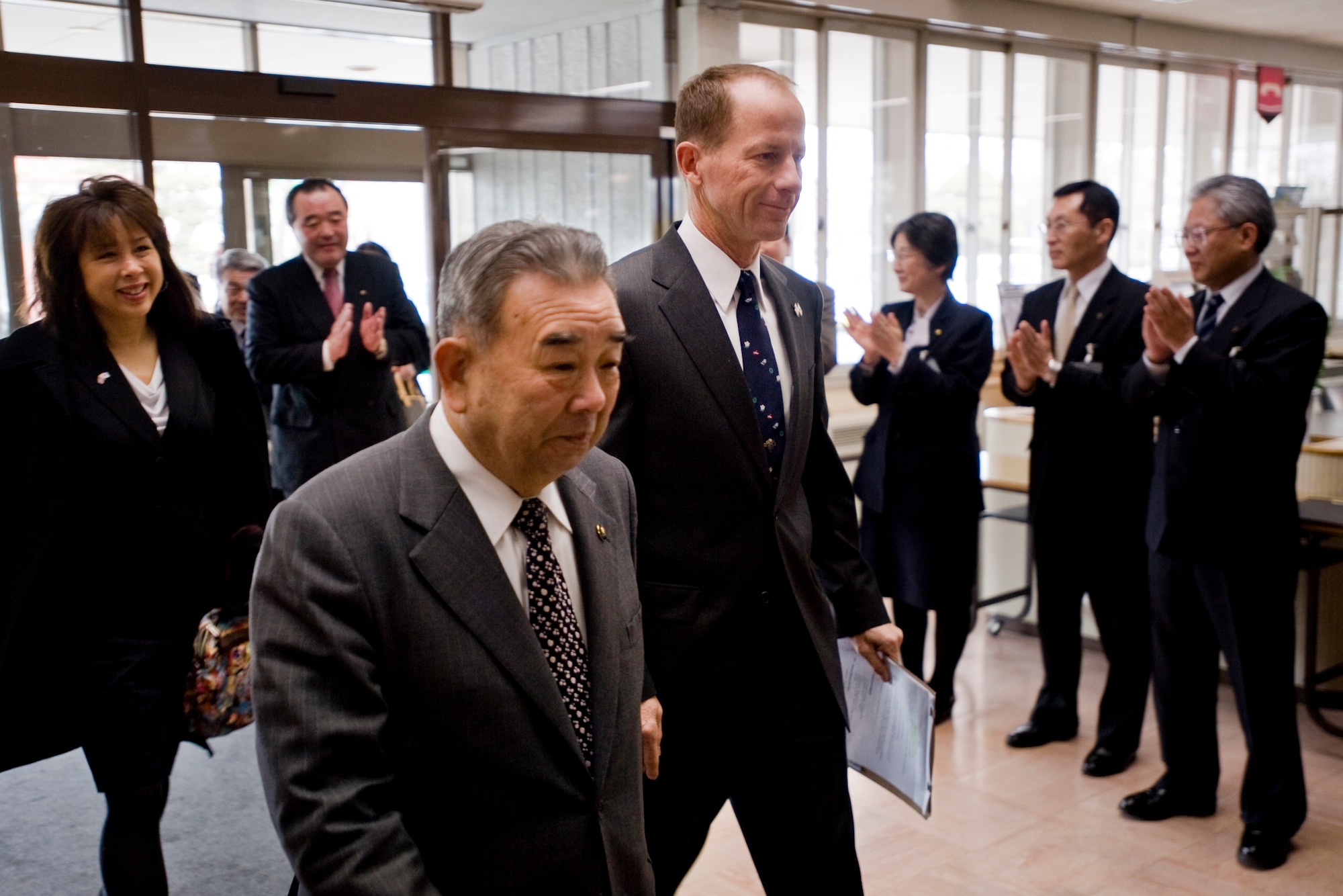 MISAWA CITY, Japan -- Col. David Stilwell, 35th Fighter Wing commander and Misawa City Mayor Kazumasa Taneichi enter Misawa City Hall during the Misawa Mayor for a Day event March 23. During the event, Colonel Stilwell assumed the role of honorary Misawa City Mayor for one day. (U.S. Air Force photo/Senior Airman Jamal D. Sutter)