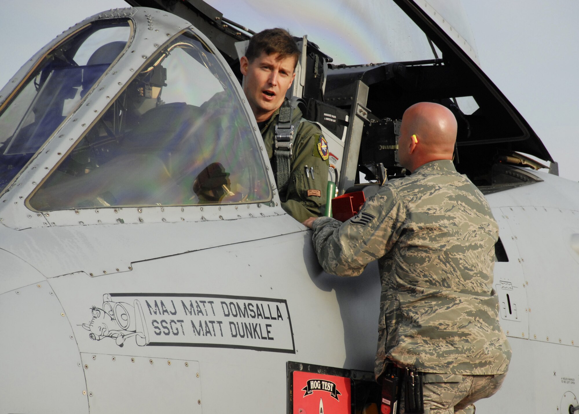 Maj. Chris Seager, a test pilot with the 40th Flight Test Squadron at Eglin Air Force Base, Fla., along with his crew chief, Staff Sgt. Rusty Jones, performs a pre-flight check on his A-10C Thunderbolt II March 25, 2010.  He was preparing for the first flight of an aircraft powered solely by a biomass-derived jet fuel blend. The A-10 was fueled with a 50/50 blend of Hydrotreated Renewable Jet and JP-8.  (U.S. Air Force photo/Samuel King Jr.)