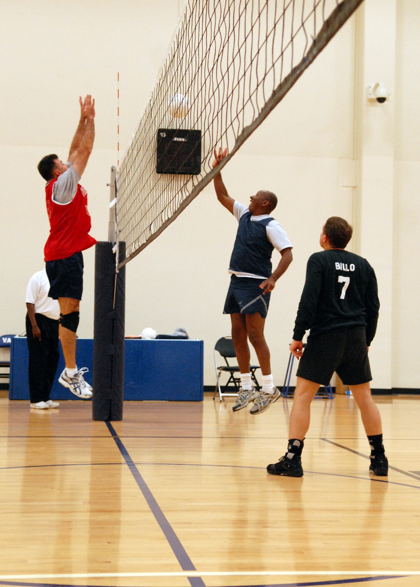 VANDENBERG AIR FORCE BASE, Calif. -- Keeping the volley going, Anthony Vauclin, a member of the 30th Space Communications Squadron team, sets the ball over the net toward an opponent during an intramural volleyball game here Wednesday, March 24, 2010. The 30th Space Wing Staff Agencies defeated the 30th SCS team 2-1. (U.S. Air Force photo/Airman 1st Class Angelina Drake)