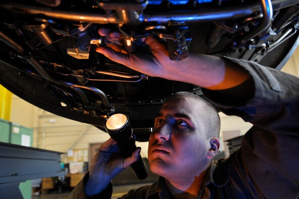 ELLSWORTH AIR FORCE BASE, S.D. – Airman 1st Class Jonathan Bettenhausen, 28th Maintenance Squadron aerospace propulsion technician, inspects a B-1B Lancer engine for possible broken safety wires and missing parts, March 25.  The B-1 engines are inspected after every 100 hours of flying. (U.S. Air Force photo/Senior Airman Marc I. Lane)