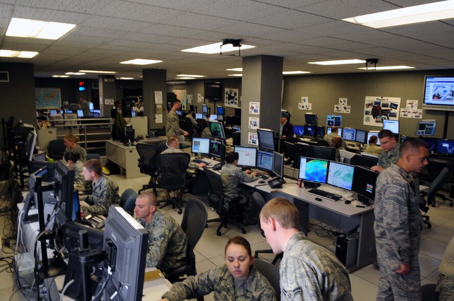 BARKSDALE AIR FORCE BASE, La. -- Airmen from the 26th Operational Weather Squadron obverse weather conditions in their assigned regions March 24. The 26 OWS is undergoing upgrades to equipment and software to enhance weather forecasting and storm reporting. (U.S. Air Force photo by Airman 1st Class Joseph Boals)
