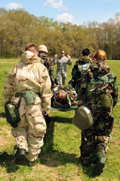 BARKSDALE AIR FORCE BASE, La. -- Participants in an Ability to Survive and Operate rodeo practice self aid and buddy care by carrying a litter under the guidance of medical training personnel at Cullen Park, March 24. The ATSO rodeo was held to prepare Airmen for a phase-two Conventional Operational Readiness Exercise. (U.S. Air Force photo by Senior Airman Joanna M. Kresge)