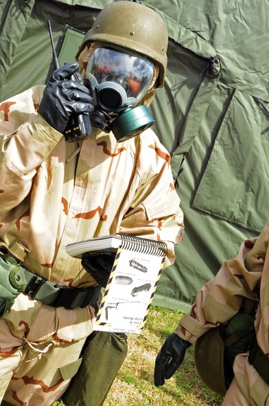 BARKSDALE AIR FORCE BASE, La. -- A participant in an Ability to Survive and Operate rodeo identifies a dummy unexploded ordnance March 24. The ATSO rodeo was held to prepare Airmen for a phase-two Conventional Operational Readiness Exercise. (U.S. Air Force photo by Senior Airman Joanna M. Kresge)