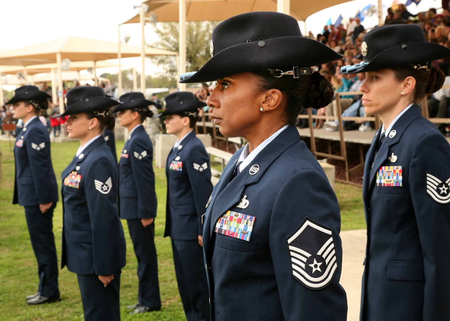 Master Sgt. LaTanya Dinkins (foreground), 320th Training Squadron, serves as the commander of troops during the Air Force Basic Military Training graduation parade March 19. Honoring Women's History Month, all staff and flight commander positions during the parade were filled by women from the 737th Training Group. (U.S. Air Force photo/Robbin Cresswell)