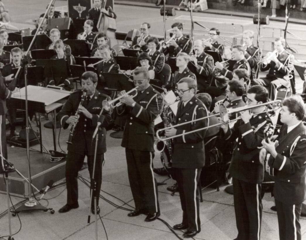 Concert Band Dixie Ensemble, performing the Dixie portion of "A Clarinet Chronology" (L to R): Jim Murphy, Jim Hutchinson, Keith Young, Bruce Bevans and Walt Johns, with Colonel Arnald D. Gabriel conducting. This is Photo 29. (Unknown Photographer)