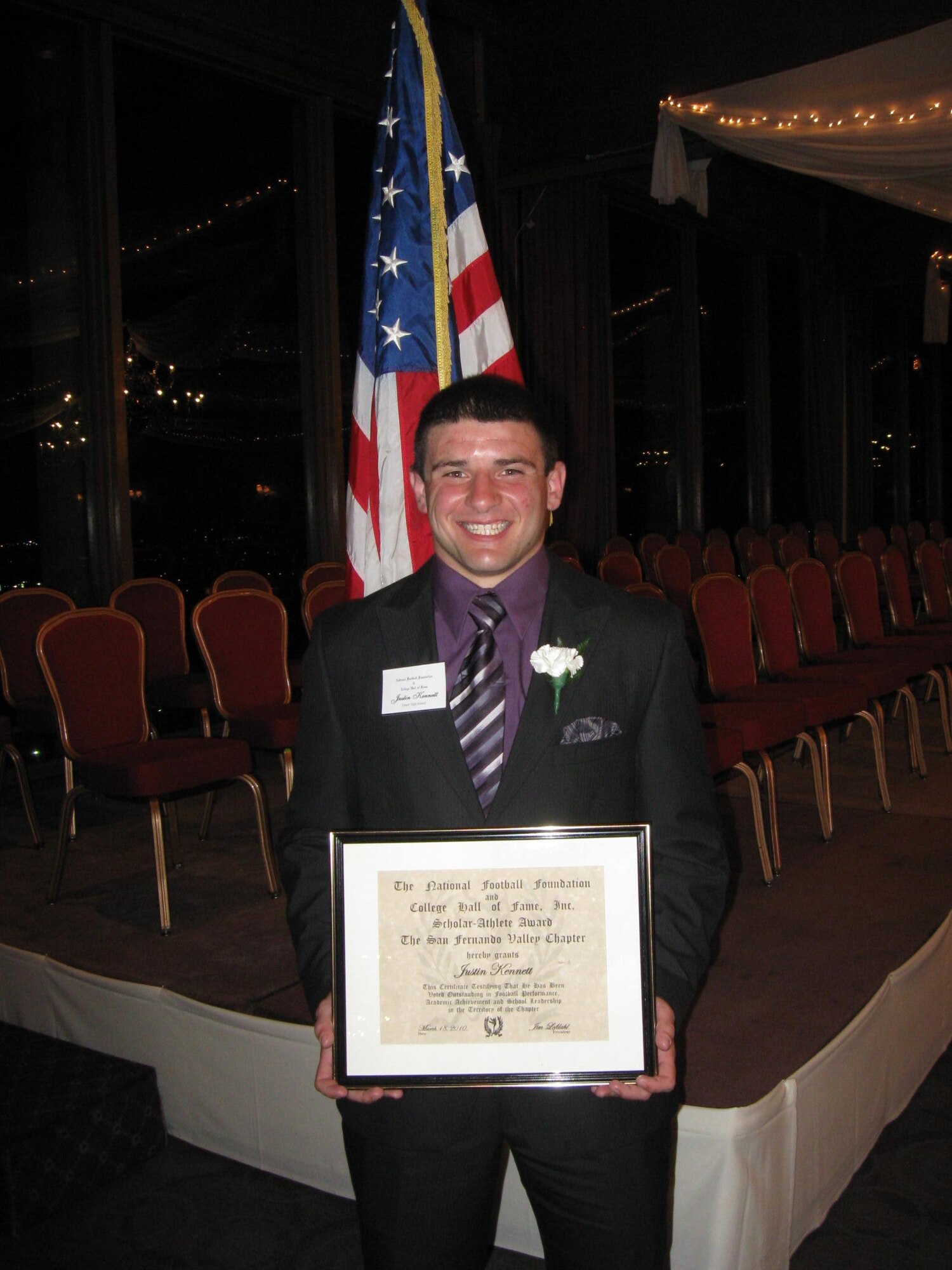 Desert High School student, Justin Kennett shows the award he received during the San Fernando Valley 36th Annual Scholar Athlete Awards banquet March 18.
The awards were given to 45 young men throughout the region and are
sponsored by the National Football Foundation and College Hall of Fame. (Courtesy photo)
