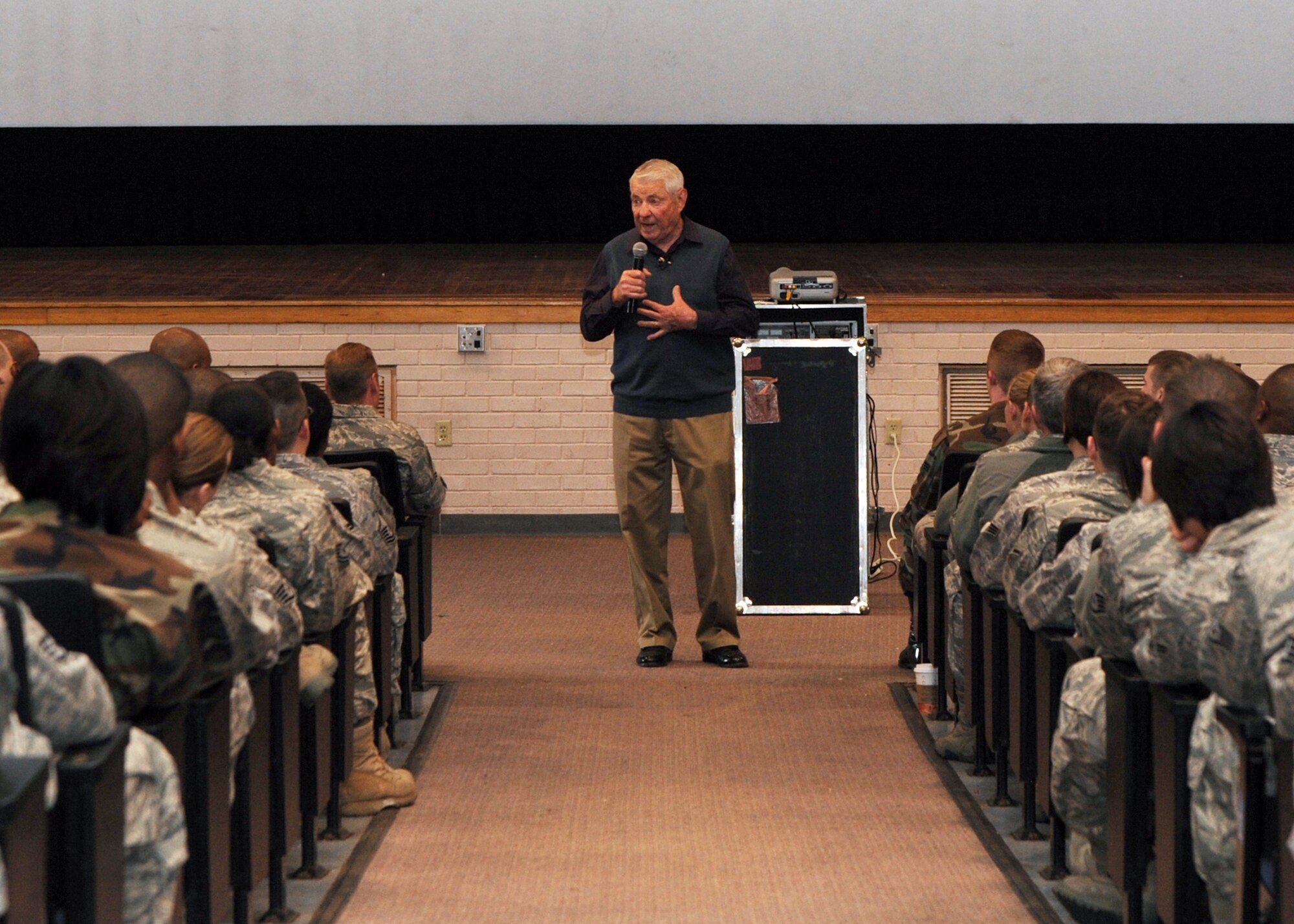 Former Chief Master Sgt. of the Air Force Robert Gaylor speaks to Team McConnell Airmen during an enlisted all-call at the base theater, March, 24, 2010, at McConnell Air Force Base, Kan. Chief Gaylor, the fifth chief master sergeant of the Air Force, shared his past military experiences, encouraged Airmen to take advantage of opportunities the Air Force offers and to take pride in their work and professional development. (U.S. Air Force photo/Airman 1st Class Andrea Salazar)