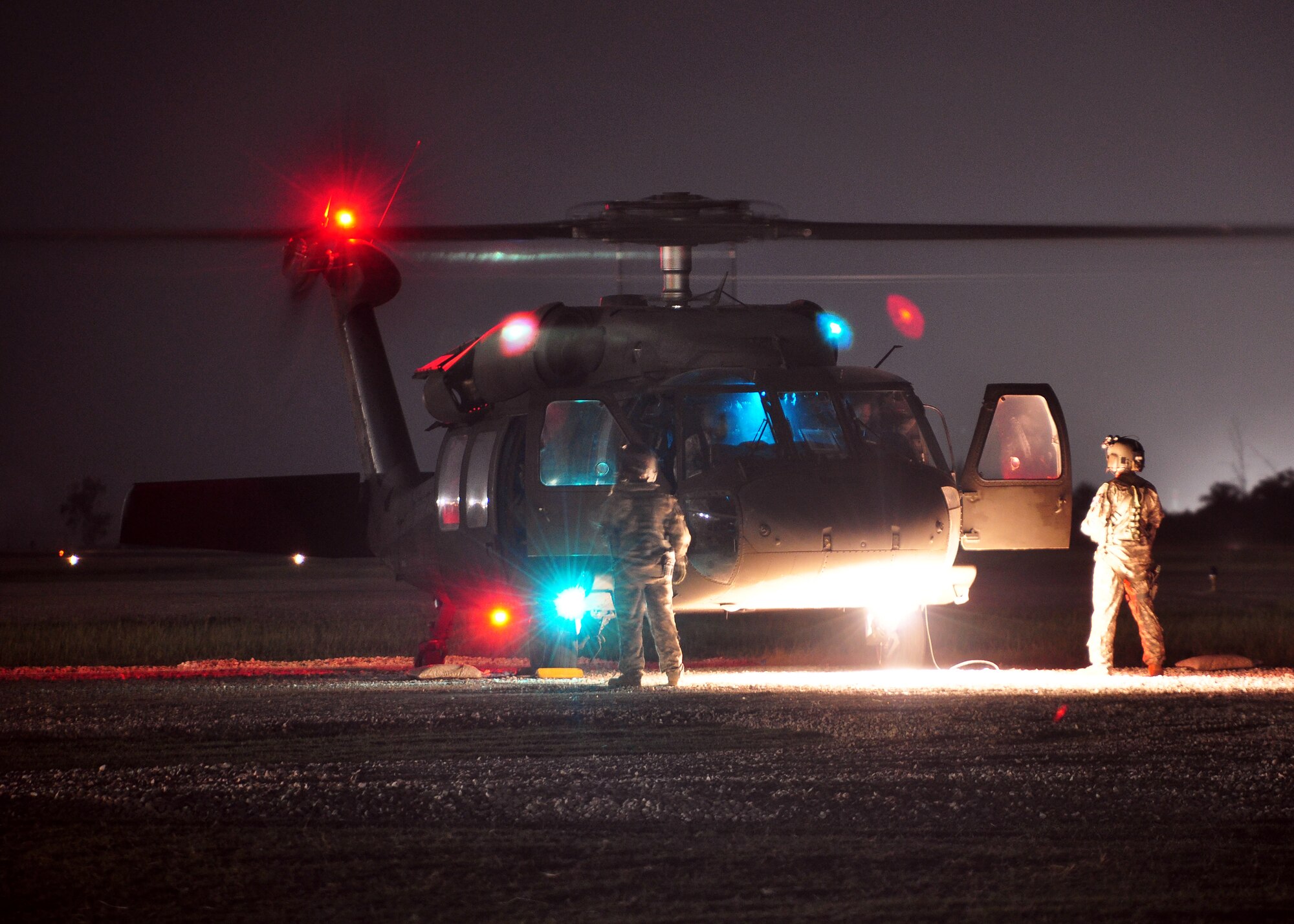 Aircrew from 1st Battalion, 228th Aviation Regiment, prepare to take off for a night flight orientation of Haiti March 24. The 1/228th along with other members of Joint Task Force-Bravo deployed March 21 to support Joint Task Force-Haiti, the U.S. military's task force assisting in disaster relief efforts in Haiti following the Jan. 12 earthquake as part of Operation Unified Response. (U.S. Air Force photo/Staff Sgt. Bryan Franks)