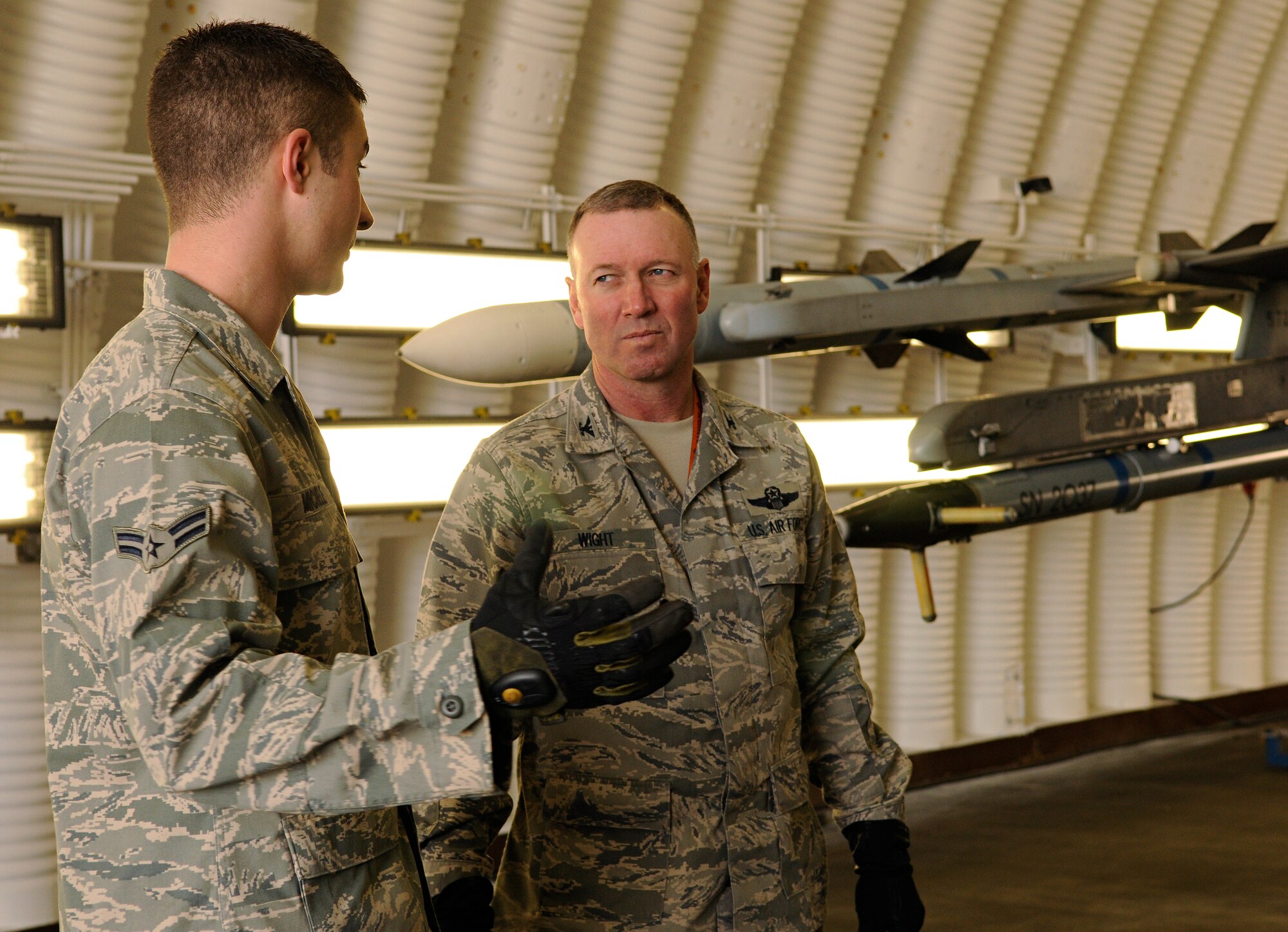 SPANGDAHLEM AIR BASE, Germany – Airman 1st Class Jason Michele, 52nd Aircraft Maintenance Squadron assistant dedicated crew chief, explains to Col. Tip Wight, 52nd Fighter Wing commander, the procedures for a walk-around inspection of an F-16 Fighting Falcon while participating in the commander’s shadow program in HAS 62 March 24. The commander’s shadow program is designed to give the commander a greater awareness of the duties, responsibilities and perspectives of 52nd FW Airmen as well as directly view the contributions Airmen make to the wing. (U.S. Air Force photo/Senior Airman Benjamin Wilson)
