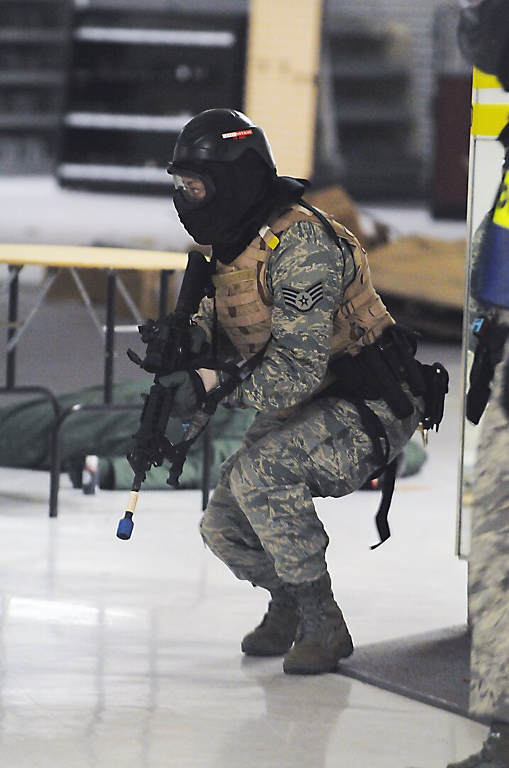 Staff Sgt. Michelle Casas of the 902nd Security Forces Squadron at Randolph Air Force Base, TX, prepares to assault a perpetrator during Active Shooter Training March 24, 2010.  (U.S. Air Force photo by Don Lindsey)