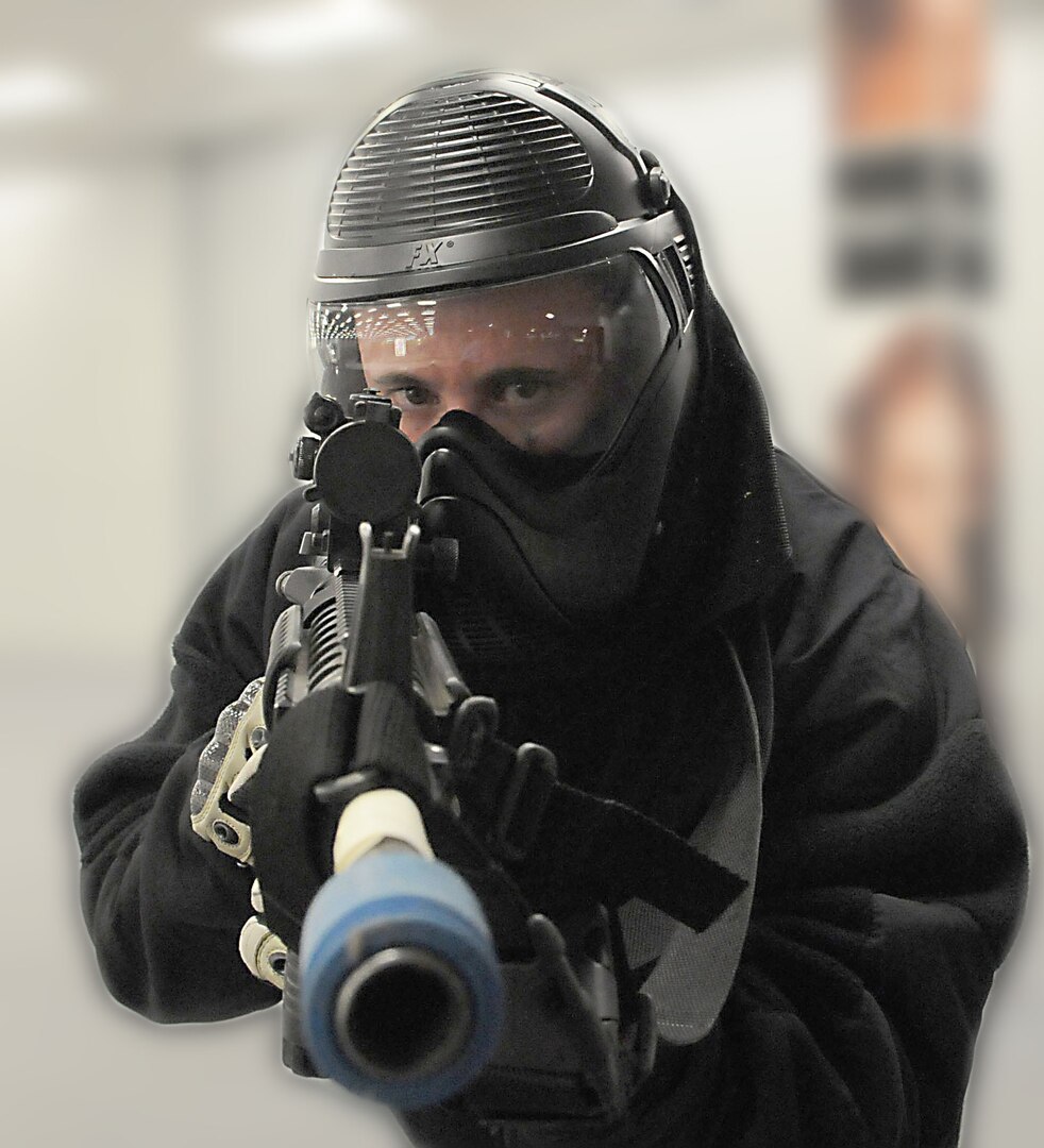 Staff Sgt. Jason Roth of the 902nd Security Forces Squadron at Randolph Air Force Base, prepares to be a shooter during security forces Active Shooter Training at the old Base Exchange facility March 24, 2010.  (U.S. Air Force photo by Don Lindsey)