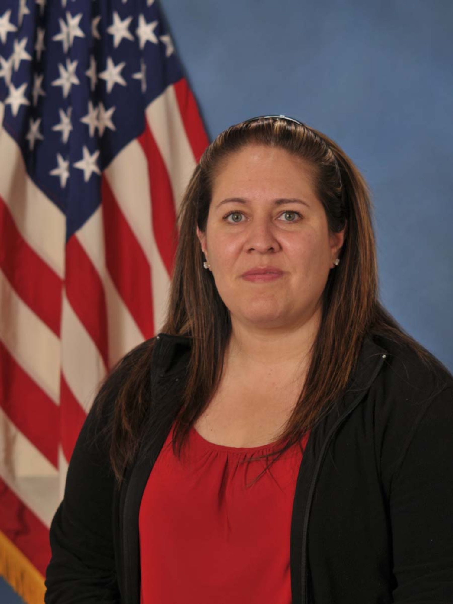 Ms. Liza Ojeda-Agushi from the Headquarters Air Force Operational Test and Evaluation Center's Manpower, Personnel and Training Directorate at Kirtland AFB, N.M., is the 2009 AFOTEC Category III Civilian of the Year.