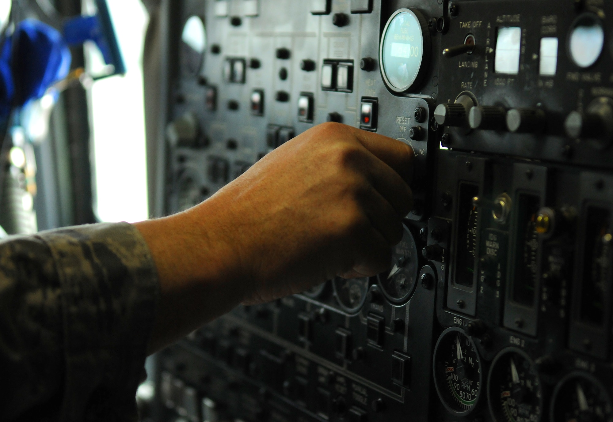 NATO AIR BASE GEILENKIRCHEN, Germany – Tech. Sgt. Richey Leamer, NATO E-3A Airborne Early Warning and Control force component E-3A Sentry crew chief, performs a preflight checklist in the cockpit of an E-3A March 19. The E-3A is a four-engine, modified Boeing 707-320 aircraft that provides all-weather surveillance, command, control and communications needed by the commanders of NATO air forces. The component’s mission is to provide aircraft and trained aircrews to deliver a surveillance and/or control platform whenever directed by the NATO AWACS commander on behalf of the supreme allied commander, Europe. (U.S. Air Force photo/Senior Airman Nathanael Callon)