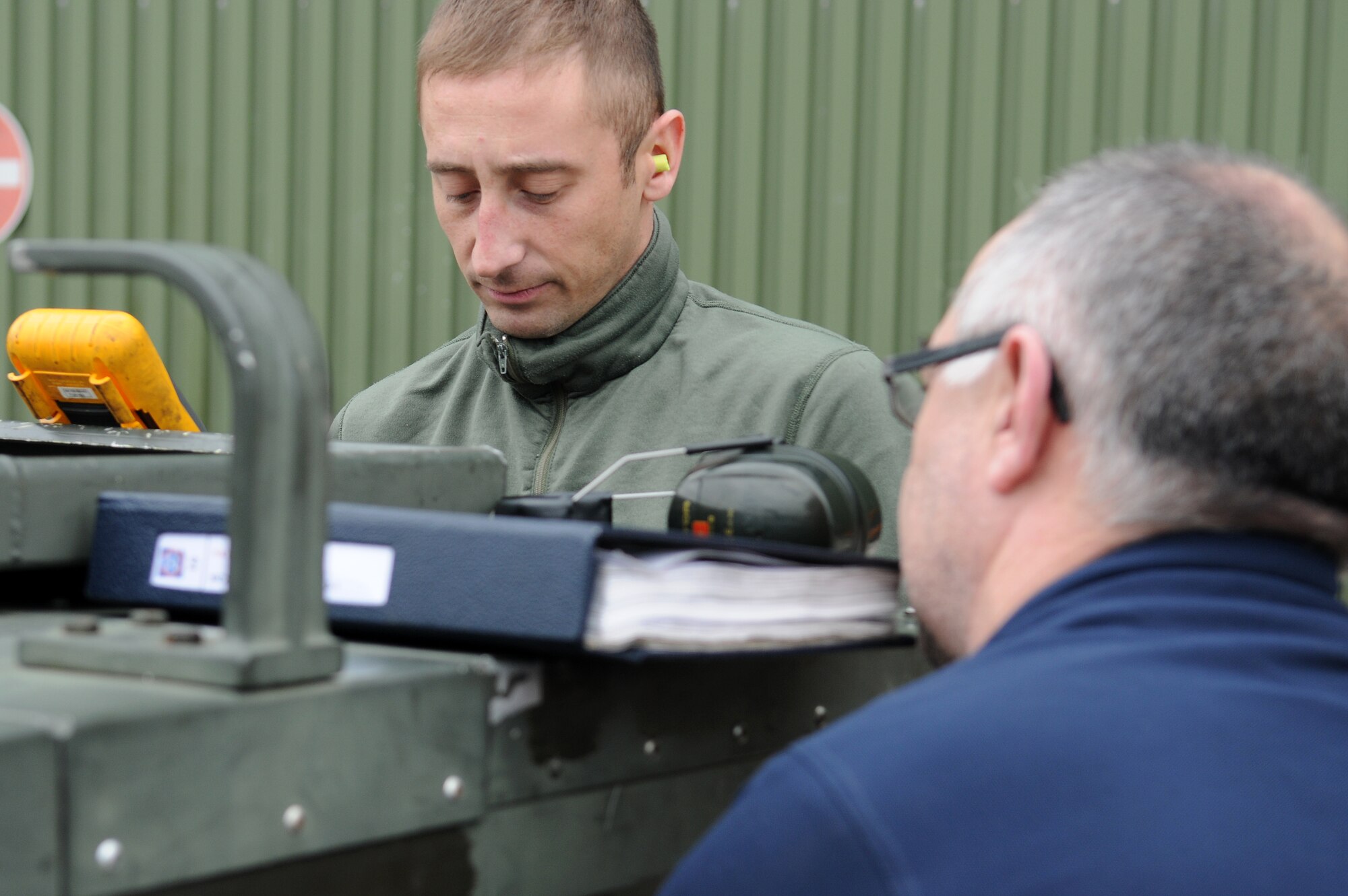 NATO AIR BASE GEILENKIRCHEN, Germany – Senior Airman Michael Miller, NATO E-3A Airborne Early Warning and Control force component aerospace ground equipment journeyman, performs generator maintenance with Fernando Garcia, a Spanish equipment maintenance specialist, at a hangar March 19. The E-3A component is made of 15 nations and is NATO’s only multinational operational flying unit. (U.S. Air Force photo/Senior Airman Nathanael Callon)