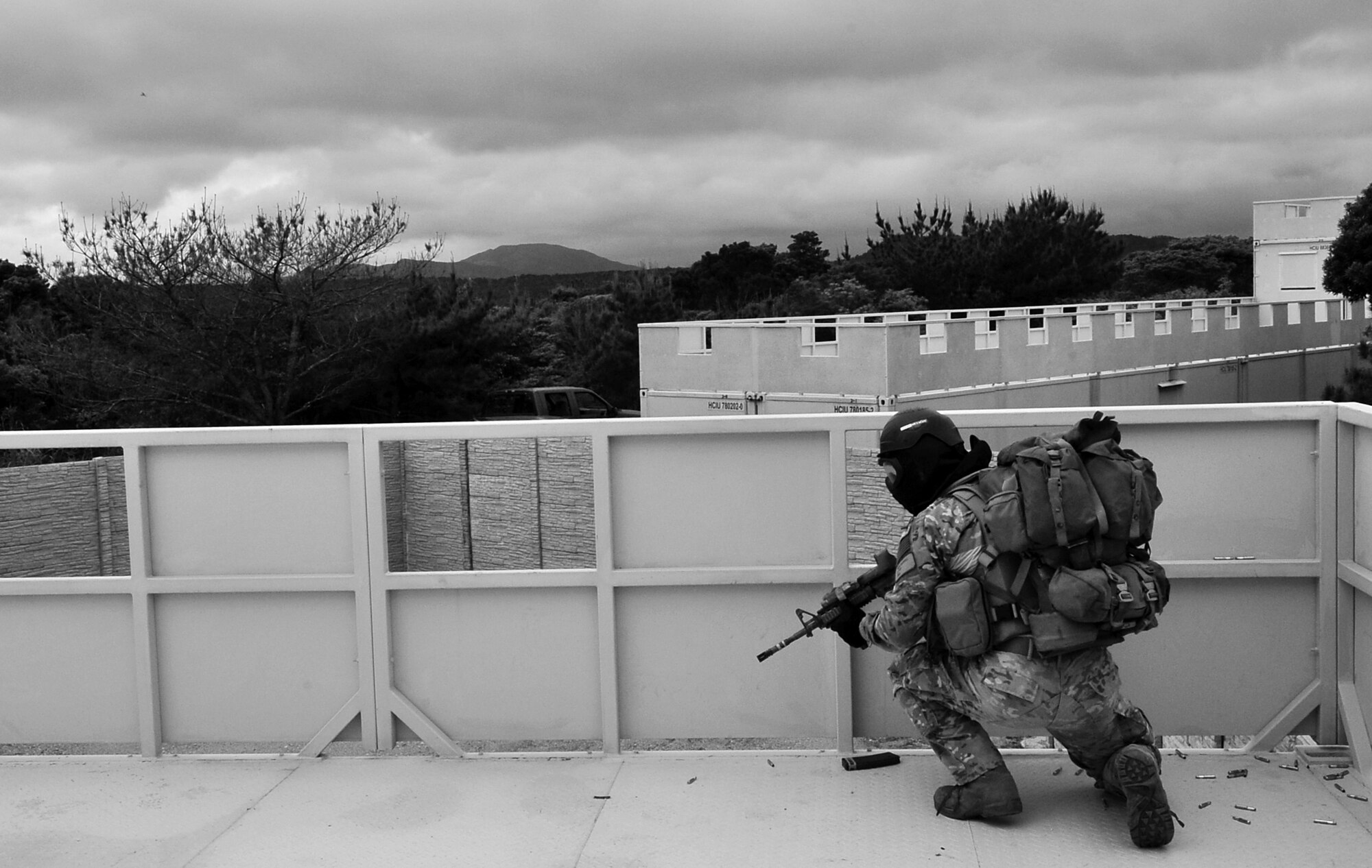 Members of the 31st Rescue Squadron conduct a simulated combat rescue operation in hostile territory at Camp Hansen during Beverly High 10-02 March 25, 2010. The training was part of a Local Operational Readiness Exercise designed to evaluate the readiness of Kadena Airmen.  (U.S. Air Force photo/Tech. Sgt. Rey Ramon)   