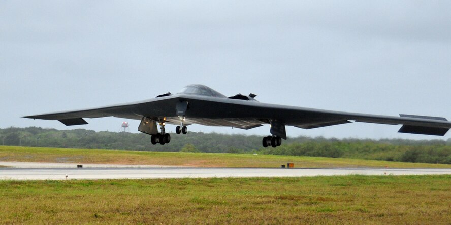 ANDERSEN AIR FORCE BASE, Guam - A B-2 Spirit, forward deployed from Whiteman Air Force Base, prepares to land March 23. The B-2 is a multi-role bomber capable of delivering both conventional and nuclear munitions and is deployed here in support of Andersen's continuous bomber presence in the pacific. (U.S. Air Force photo by Airman 1st Class Julian North)