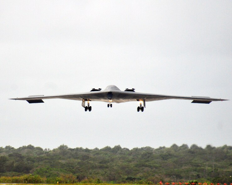 ANDERSEN AIR FORCE BASE, Guam - A B-2 Spirit, forward deployed from Whiteman Air Force Base, prepares to land March 23. The B-2 is a multi-role bomber capable of delivering both conventional and nuclear munitions and is deployed here in support of Andersen's continuous bomber presence in the pacific. (U.S. Air Force photo by Airman 1st Class Julian North)