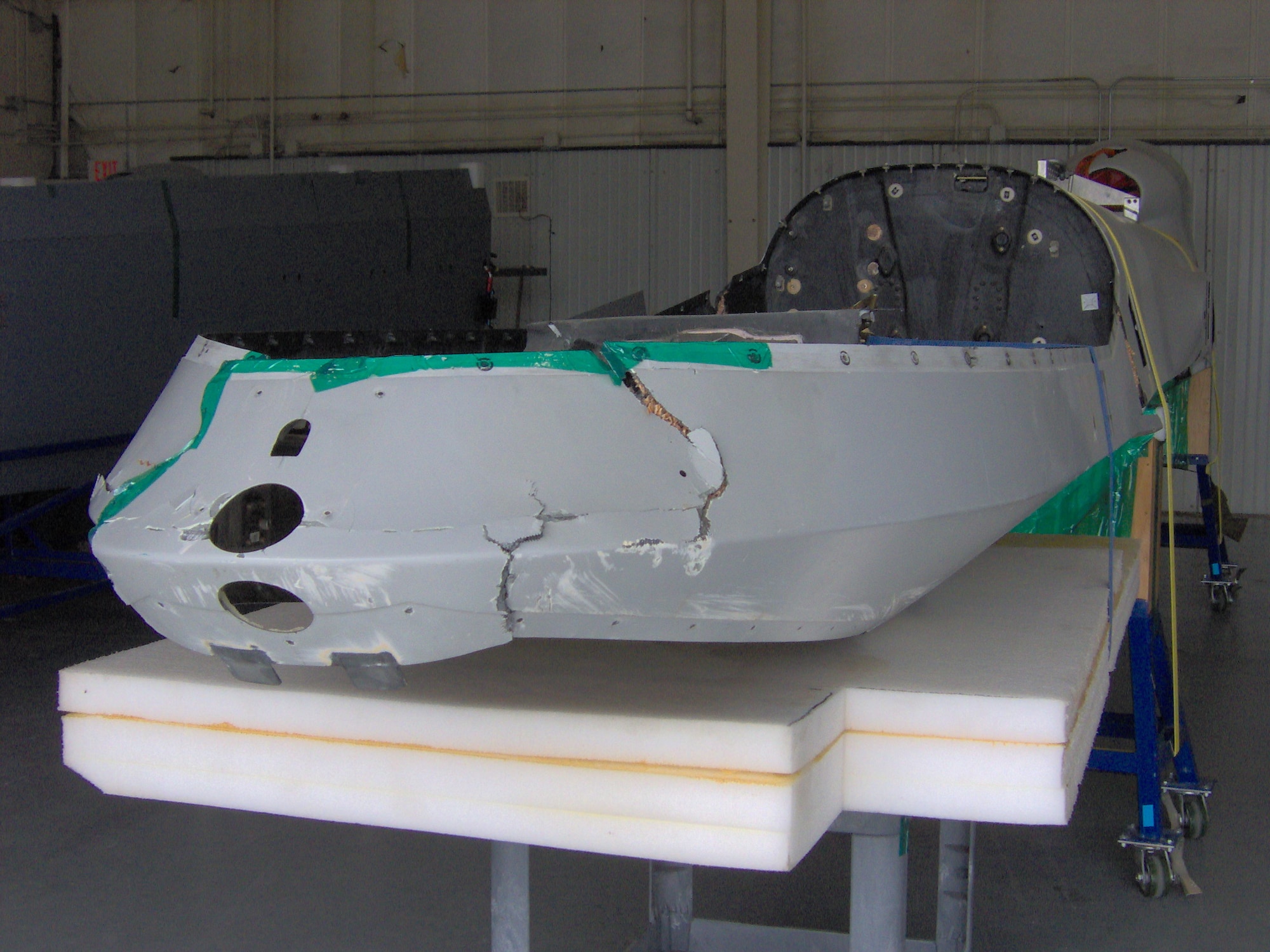 An MQ-9 Reaper suffered massive body damage after it crashed into the ground more than a year ago.  The crashed MQ-9 Reaper was sent to Sheppard Air Force Base, Texas, to be repaired and converted into the first MQ-9 Reaper maintenance trainer.  (U.S. Air Force courtesy photo).