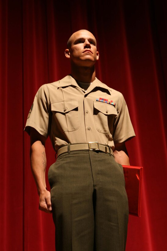 Cpl. Kody Whittal, the "Gung-Ho" recipient from the first Marine Corps Air Station Miramar Corporals Course,  stands after receiving his award at the Bob Hope Theater here March 25.