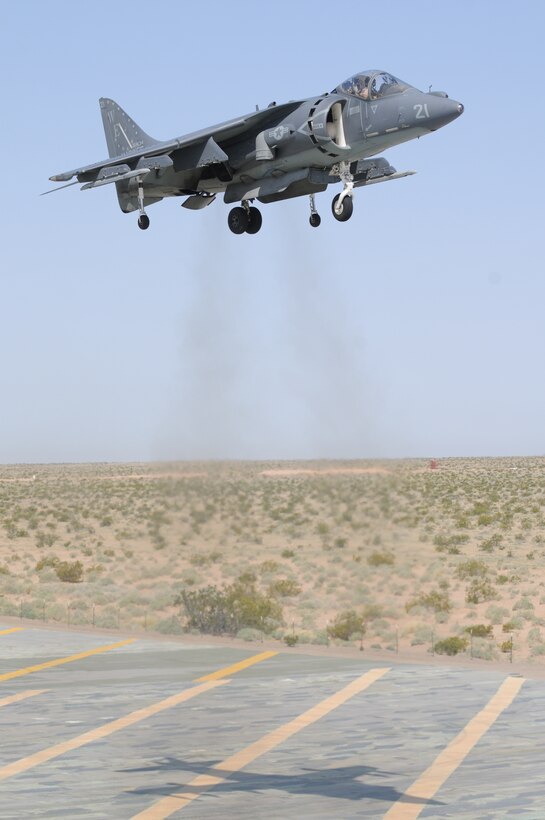 Capt. Jacob Fielstra, Marine Attack Squadron 214 pilot lands an AV-8B Harrier on Auxiliary Airfield 2 runway during aircraft carrier landing practice at the Barry M. Goldwater Range in Yuma, Ariz., March 25, 2010. The exercise is the first time the squadron has practiced carrier landings since their return from Afghanistan in November 2009. Pilots practiced for two days on the simulated ship deck. “Operations aboard ships are some of the most challenging things we do as pilots,” said British Royal Navy Lt. Duncan Telfer, squadron exchange pilot. Carrier landing training consists of flight simulator practice and landing in AUX-2, before qualifying at sea. “As part of readiness, it’s an important skill set to learn and maintain, and very perishable,” said Telfer.