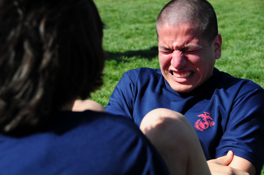 LUKE AIR FORCE BASE, Ariz. - During the Recruiting Station Phoenix all-hands pool function here, March 27, the future Marines of Arizona took the initial strength test. The recruiting sub-station who scored the highest average won the event. Before beginning the event, R.S. Phoenix commanding officer, Maj. Thomas Hodge, challenged the poolees to push themselves to their breaking points. (U.S. Marine Corps photo by Cpl. Fredrick J. Coleman)(Released)