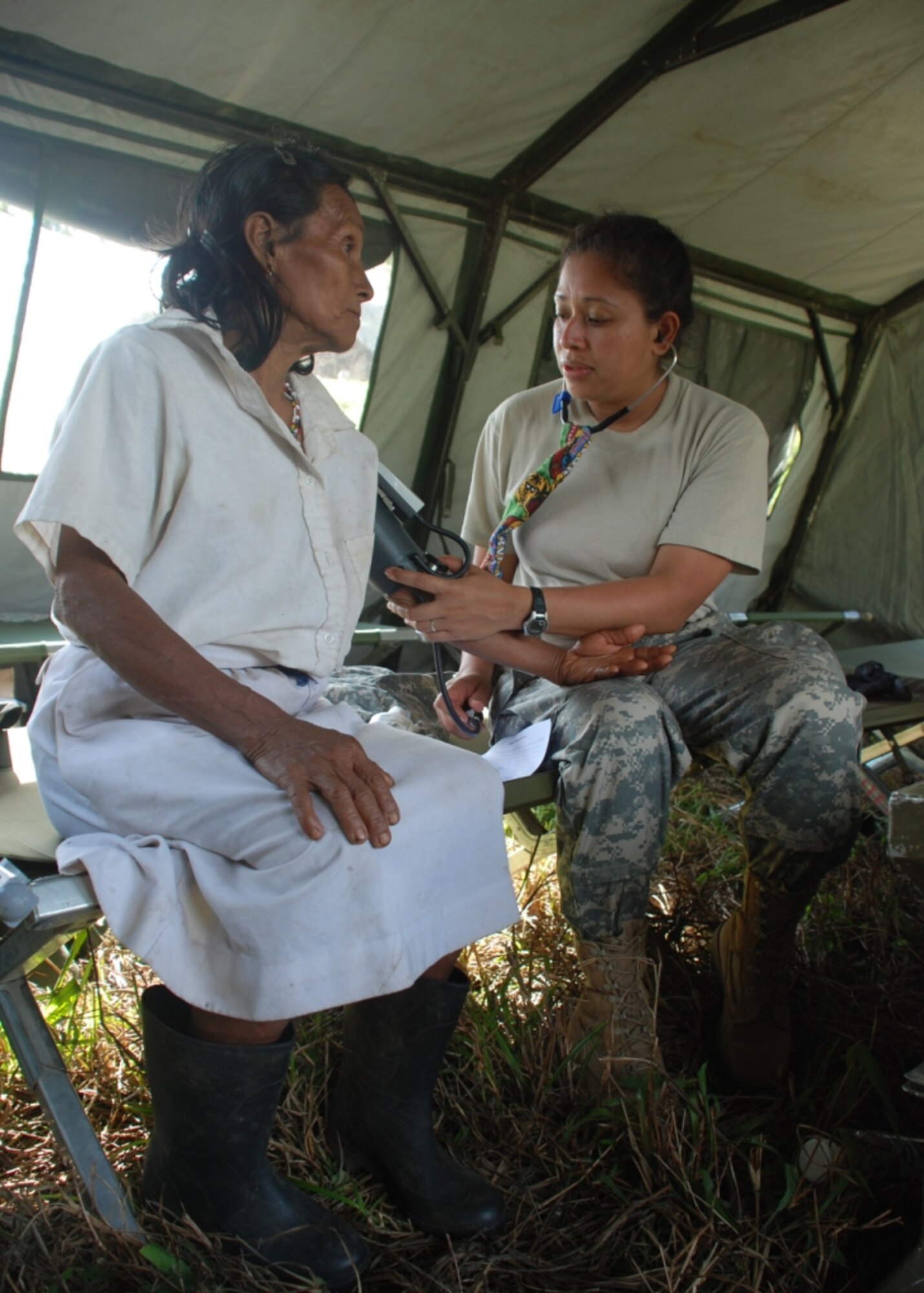 Army 1st Lt. Judiza Zelaya, Medical Element registered nurse, checks the blood pressure of a Costa Rican woman during a medical civic assistance program, or MEDCAP, held March 24-26 in Piedra Meza, Costa Rica.  A total of 253 patients received care during the MEDCAP, conducted by 15 Joint Task Force-Bravo Medical Element personnel, in cooperation with Costa Rican healthcare providers, the Costa Rican police and members of the U.S. Military Group in Costa Rica. (U.S. Air Force photo by 1st Lt. Jen Richard)