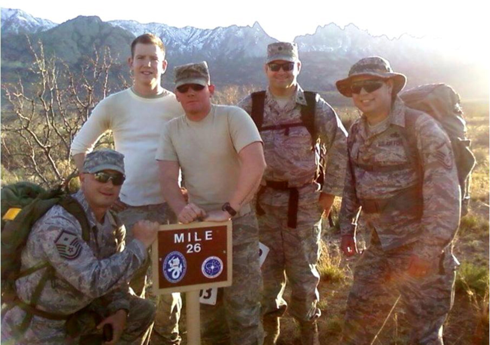 Members of Team Sheppard completed the Bataan Memorial Death March in the military heavy division at White Sands Missile Range, N.M., March 21.  The annual event, run by the U.S. Army, commemorates the "Battling Bastards of Bataan" and honors the sacrifice of the survivors of the Surrender of Corregidor in World War II and their prisoner of war experience. Pictured from left are Master Sgt. Jeremy Harmon, 365th Training Squadron; Airman 1st Class Doug Smith, 82nd Security Forces Squadron; Airman 1st Class Shane Maynard, 82nd Force Support Squadron; Lt. Col. Michael Braucher, 365th TRS; and Master Sgt. Dave Mills, 365th TRS. Not pictured are the members of the second team from the 366th TRS including: Capt. Meghan Corbett, Tech. Sgt. Timothy Wieser, Master Sgt. William Speyrer, Master Sgt. Jason Mitchell and Staff Sgt. Cameron Steele. (U.S. Air Force photo courtesy)